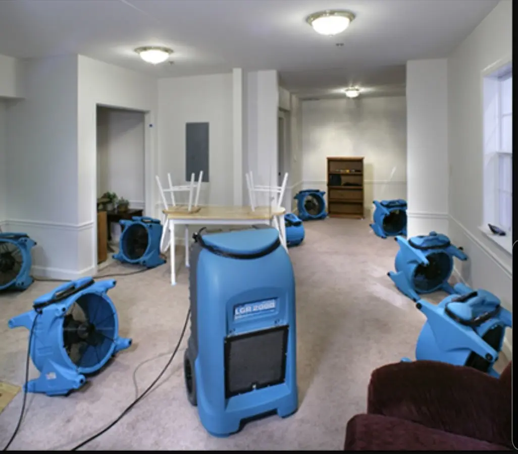 Air movers and dehumidifier setup for Water Damage Restoration in Orosi
